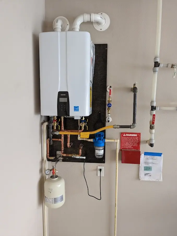 Professional plumber installing copper piping in a Blackshear home